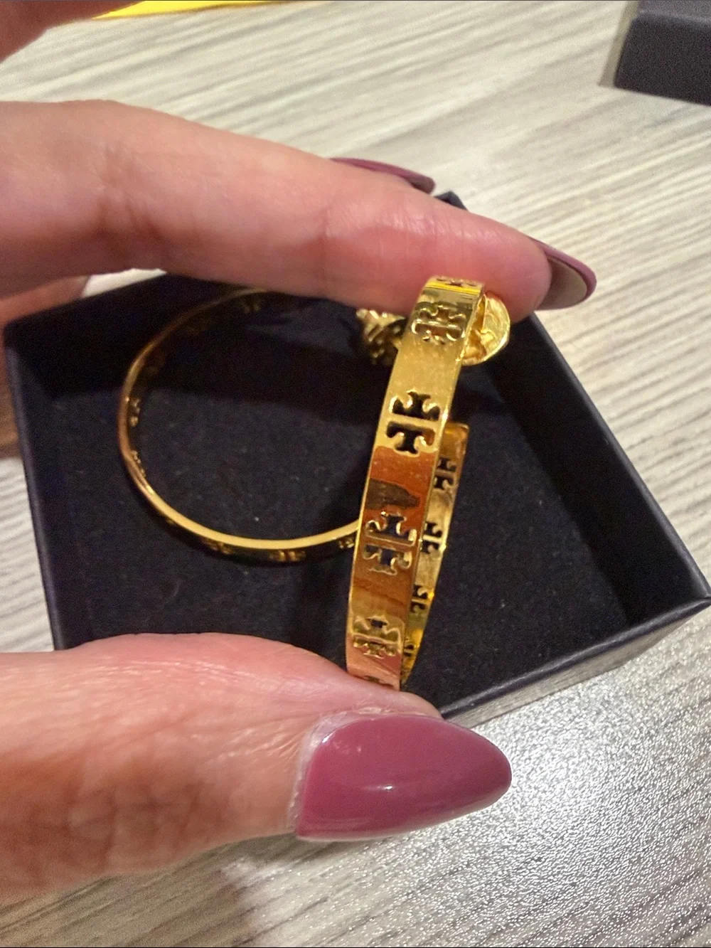 Tory Birch gold tone hoops
